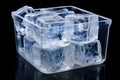 large transparent beautiful ice cubes in a plastic box