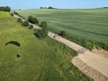 Large tree stump marking road closure before construction of new bridge bypass Royalty Free Stock Photo