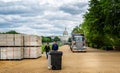 Large truck arriving on the Mall in front of The Capitol Building to remove event flooring in Washington DC, USA