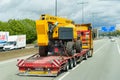 A large truck is driving along the highway.