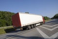 Large truck zooming past Royalty Free Stock Photo