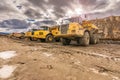 Large trucks in an open pit mine Royalty Free Stock Photo