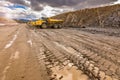 Large trucks in an open pit mine Royalty Free Stock Photo