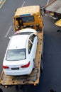 Large trucks ready for shipment of cars, in the car after the exhibition