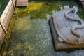 Large Turtle and Snake statue in the Large water pond with Yuan money in water pont at Foshan Ancestral Temple