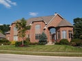 Large Two Story New Brick Home With Turret Royalty Free Stock Photo