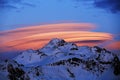 Large UFO or a big cloud over the crest of the mountains of the Bellecote (3417 m). La Pl Royalty Free Stock Photo