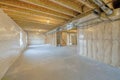 Large unfinished basement with woodframes and wall insulation Royalty Free Stock Photo