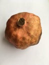 Large unpeeled pomegranate close. Abstract shot.