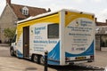 Large van providing information on sight loss to the public.Somerset, UK.