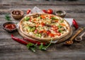 Large vegeterian pizza with sauces and pepper