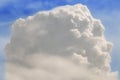A Large Vertical Cloud Against The Blue Sky. Lonely Giant Cumulus Cloud