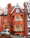 Handsome red brick building with elaborate details. Royalty Free Stock Photo