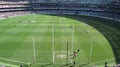 Large view from the stands of Melbourne Cricket Ground field during a footy game Royalty Free Stock Photo