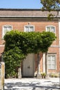 Large villa house with ivy plant in the entrace Royalty Free Stock Photo