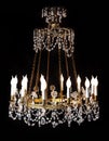 Large crystal chandelier isolated on black background. Royalty Free Stock Photo