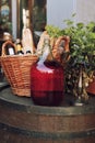 Large Vintage Wine Bottles of red wine standing on a barrel. Old sealed bottle of red wine Royalty Free Stock Photo