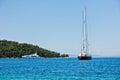 Large vintage yacht in front of Panormos beach at morning, Panormos bay, Skopelos island