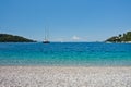 Large vintage yacht in front of Panormos beach at morning, Skopelos island