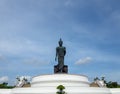 Large walking buddha statue in Thailand