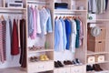 Large wardrobe with different clothes