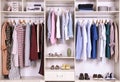 Large wardrobe with different clothes