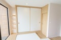 Large wardrobe Japanese-style white sliding door. Royalty Free Stock Photo