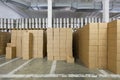 Large warehouse with beer kegs and cardboard boxes in stock brewery Ochakovo