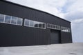 warehouse exterior with sheet metal and automatic gate