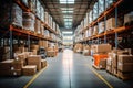 A large warehouse with many items and rows of shelves with many boxes Royalty Free Stock Photo