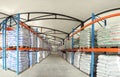 Large warehouses of sacks of animal feed. Veterinary production. Animal feed in stock. Pallets with cargo.
