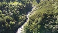 The large waterfall flowing from the mountain. Waterfall with a very high flow. Waterfall Balea.