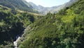 The large waterfall flowing from the mountain. Waterfall with a very high flow. Mountain Landscape. Waterfall Balea.