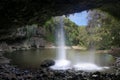 a large waterfall over a body of water near Byron Bay in Australia
