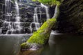 Hidden waterfall in a deep gorge with trickling white water. Forest of Bowland, Ribble Valley, Lancashire Royalty Free Stock Photo