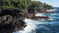 large wave crashing against lava cliffs at MacKenzie State Recreation Area, PAHOA, HAWAII