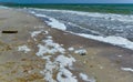 Large waves with foam near the shore during a strong storm, Black Sea, Ukraine Royalty Free Stock Photo