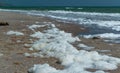 Large waves with foam near the shore during a strong storm, Black Sea, Ukraine Royalty Free Stock Photo