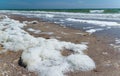 Large waves with foam near the shore during a strong storm, Black Sea, Ukraine Royalty Free Stock Photo