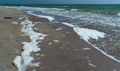 Large waves with foam near the shore during a strong storm, Black Sea, Ukraine Royalty Free Stock Photo