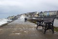 Large waves from the Irish Sea during a winter storm batter the harbor wall at the long Hole in Bangor Ireland