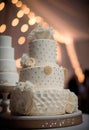 Large wedding cake decorated with a beautiful decor of cream. Royalty Free Stock Photo