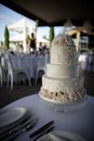 Large wedding cake decorated with a beautiful decor of cream. Royalty Free Stock Photo