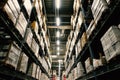 Large wharehouse with rows of shelves and goods boxes Royalty Free Stock Photo
