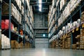 Large wharehouse with rows of shelves and goods boxes Royalty Free Stock Photo