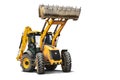 Large wheeled excavator loader or bulldozer on a white isolated background with a bucket raised up. Universal construction