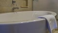 Large white acrylic bathtub. Close-up. Royalty Free Stock Photo