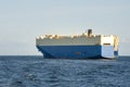 Roll-on roll-off RORO or ro-ro ships or oceangoing vehicle carrier ship anchor in the open sea