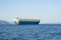 Roll-on roll-off RORO or ro-ro ships or oceangoing vehicle carrier ship anchor in the open sea