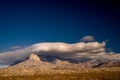 Large White Cloud Separates Guadalupe Mountains and The Deep Blue Sky Above Royalty Free Stock Photo
